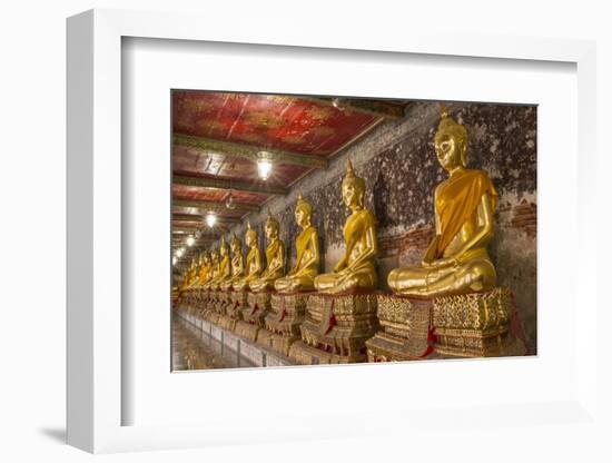 Rows of Gold Buddha Statues, Wat Suthat Temple, Bangkok, Thailand, Southeast Asia, Asia-Stephen Studd-Framed Photographic Print