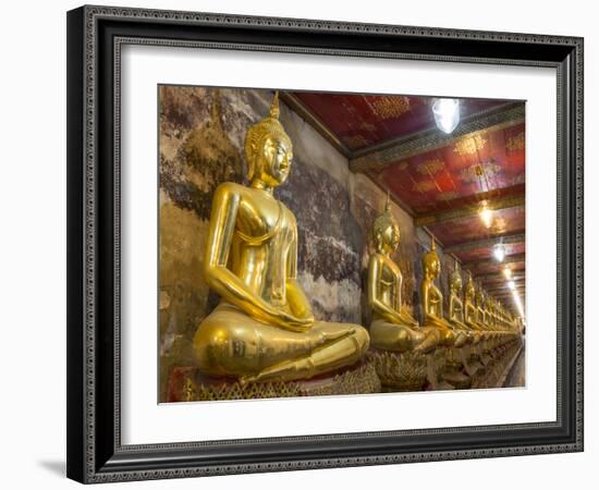 Rows of Gold Buddha Statues, Wat Suthat Temple, Bangkok, Thailand, Southeast Asia, Asia-Stephen Studd-Framed Photographic Print