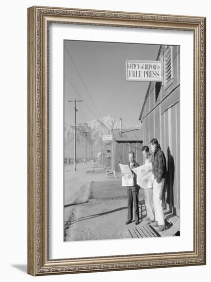 Roy Takeno (Editor) and Group Reading Manzanar Paper [I.E. Los Angeles Times] in Front of Office-Ansel Adams-Framed Art Print