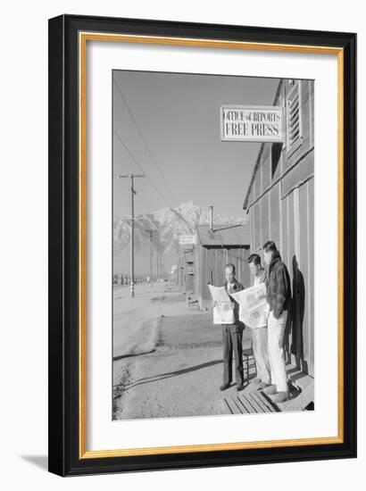 Roy Takeno (Editor) and Group Reading Manzanar Paper [I.E. Los Angeles Times] in Front of Office-Ansel Adams-Framed Art Print