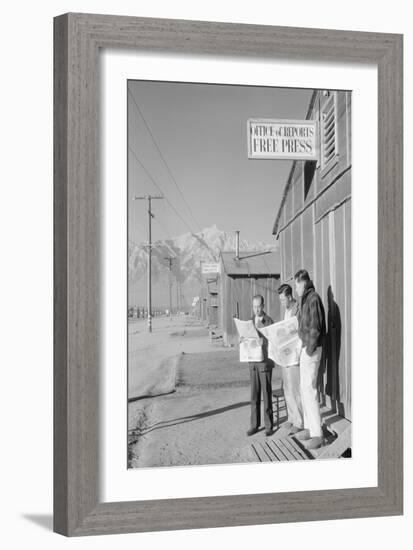 Roy Takeno (Editor) and Group Reading Manzanar Paper [I.E. Los Angeles Times] in Front of Office-Ansel Adams-Framed Premium Giclee Print