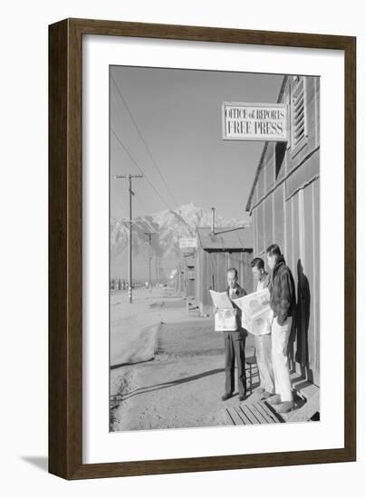 Roy Takeno (Editor) and Group Reading Manzanar Paper [I.E. Los Angeles Times] in Front of Office-Ansel Adams-Framed Premium Giclee Print