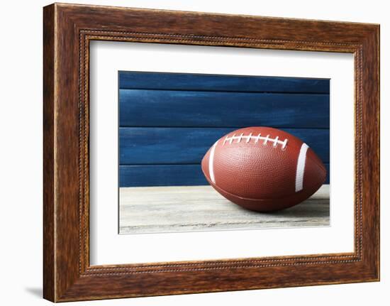 Rugby Ball on Wooden Background-Yastremska-Framed Photographic Print