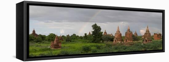 Ruined stupas with rainbow near village of Min Nan Thu, Bagan, Mandalay Region, Myanmar-null-Framed Premier Image Canvas