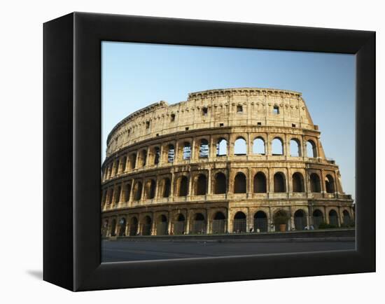 Ruins of the Coliseum in Rome Against Blue Sky-null-Framed Premier Image Canvas