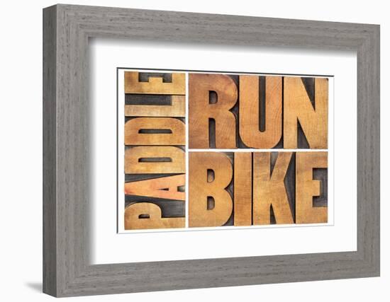 Run, Bike,  Paddle - Triathlon or Recreation Concept - Isolated Word Abstract in Vintage Letterpres-PixelsAway-Framed Photographic Print