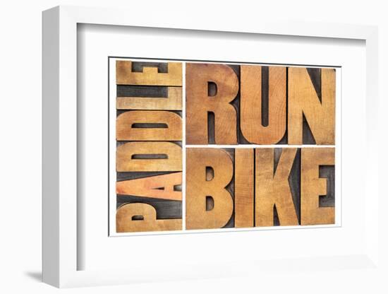 Run, Bike,  Paddle - Triathlon or Recreation Concept - Isolated Word Abstract in Vintage Letterpres-PixelsAway-Framed Photographic Print