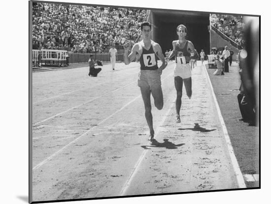 Runner John Landy, Breaking the 4 Minute Mile-Allan Grant-Mounted Photographic Print