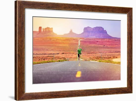 Runner Man Athlete Running Sprinting on Road by Monument Valley. Concept with Sprinter Fast Trainin-Maridav-Framed Photographic Print