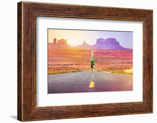 Runner Man Athlete Running Sprinting on Road by Monument Valley. Concept with Sprinter Fast Trainin-Maridav-Framed Photographic Print