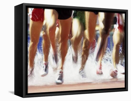 Runners Legs Splashing Through Water Jump of Track and Field Steeplechase Race, Sydney, Australia-Paul Sutton-Framed Premier Image Canvas