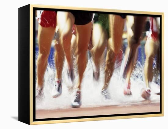 Runners Legs Splashing Through Water Jump of Track and Field Steeplechase Race, Sydney, Australia-Paul Sutton-Framed Premier Image Canvas