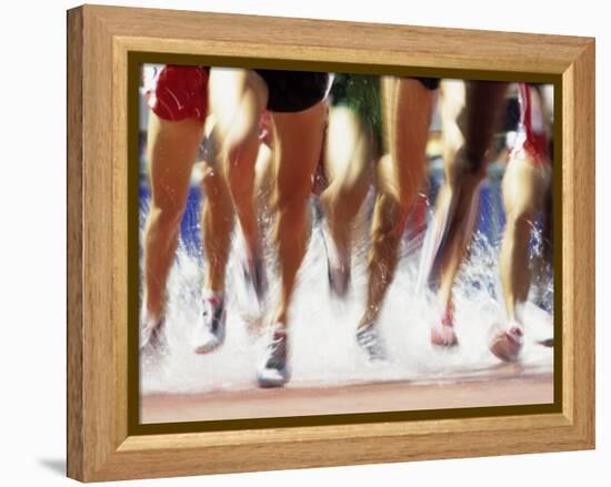 Runners Legs Splashing Through Water Jump of Track and Field Steeplechase Race, Sydney, Australia-Paul Sutton-Framed Premier Image Canvas