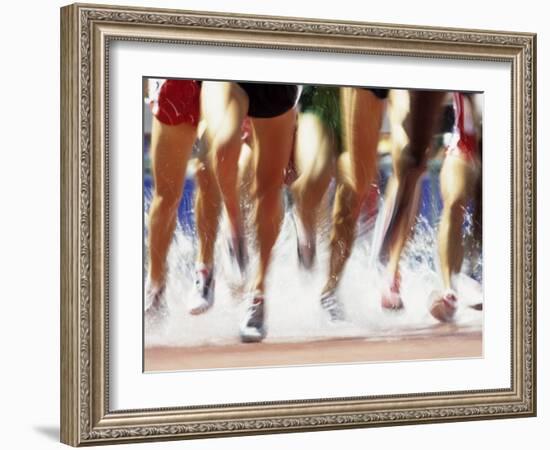 Runners Legs Splashing Through Water Jump of Track and Field Steeplechase Race, Sydney, Australia-Paul Sutton-Framed Photographic Print