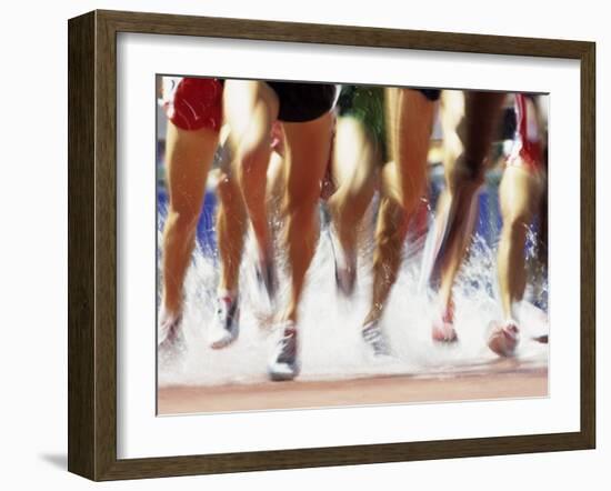 Runners Legs Splashing Through Water Jump of Track and Field Steeplechase Race, Sydney, Australia-Paul Sutton-Framed Photographic Print