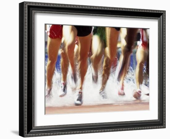 Runners Legs Splashing Through Water Jump of Track and Field Steeplechase Race, Sydney, Australia-Paul Sutton-Framed Photographic Print