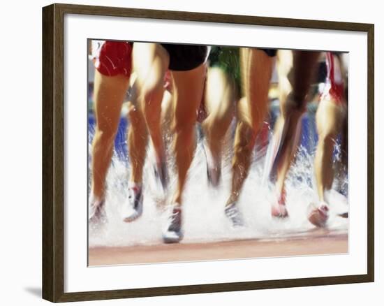 Runners Legs Splashing Through Water Jump of Track and Field Steeplechase Race, Sydney, Australia-Paul Sutton-Framed Photographic Print