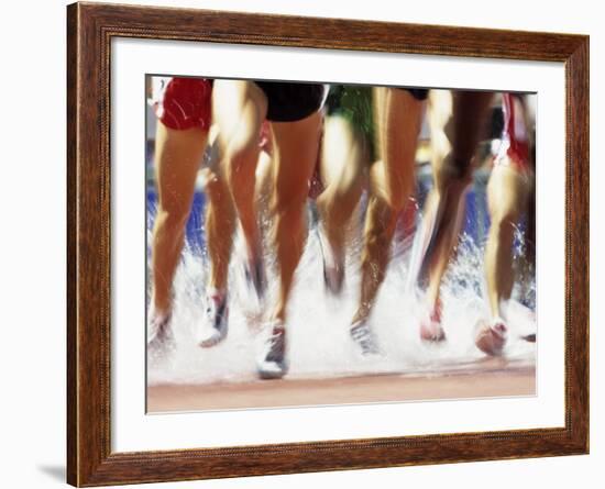 Runners Legs Splashing Through Water Jump of Track and Field Steeplechase Race, Sydney, Australia-Paul Sutton-Framed Photographic Print