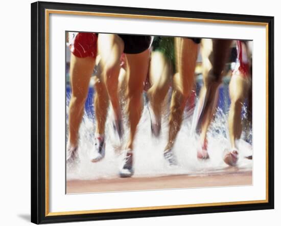 Runners Legs Splashing Through Water Jump of Track and Field Steeplechase Race, Sydney, Australia-Paul Sutton-Framed Photographic Print