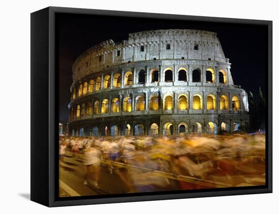 Runners Make Their Way Past the Colosseum in Rome-null-Framed Premier Image Canvas