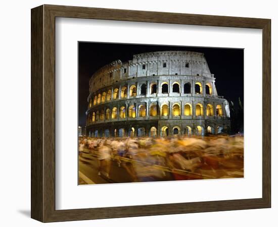 Runners Make Their Way Past the Colosseum in Rome-null-Framed Photographic Print