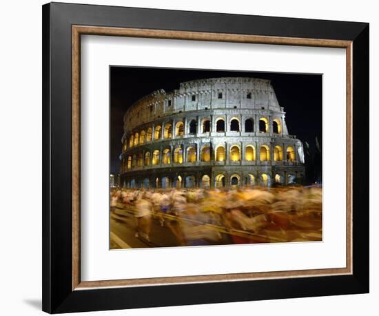 Runners Make Their Way Past the Colosseum in Rome-null-Framed Photographic Print