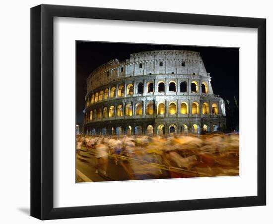 Runners Make Their Way Past the Colosseum in Rome-null-Framed Photographic Print