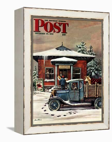 "Rural Post Office at Christmas," Saturday Evening Post Cover, December 13, 1947-Stevan Dohanos-Framed Premier Image Canvas