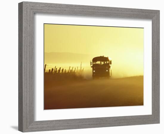 Rural School Bus Driving Along Dusty Country Road, Oregon, USA-William Sutton-Framed Photographic Print