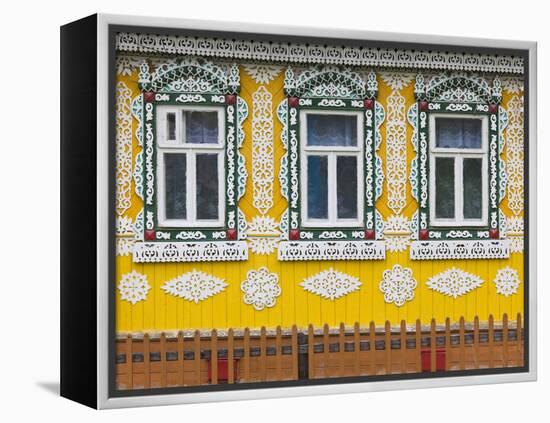 Russia, Ivanovo Oblast, Golden Ring, Plyos, House with Traditional Russian Architecture-Walter Bibikow-Framed Premier Image Canvas