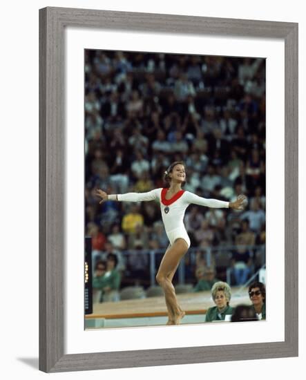 Russian Gymnast Olga Korbut Performing Floor Exercises at Summer Olympics-John Dominis-Framed Premium Photographic Print