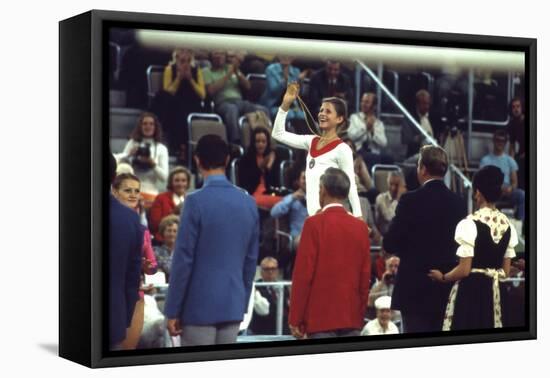 Russian Gymnast Olga Korbut Winner at the 1972 Summer Olympic Games in Munich, Germany-John Dominis-Framed Premier Image Canvas