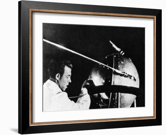 Russian Technician with Sputnik 1-null-Framed Photo