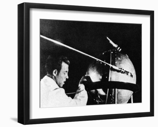 Russian Technician with Sputnik 1-null-Framed Photo