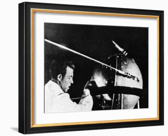 Russian Technician with Sputnik 1-null-Framed Photo