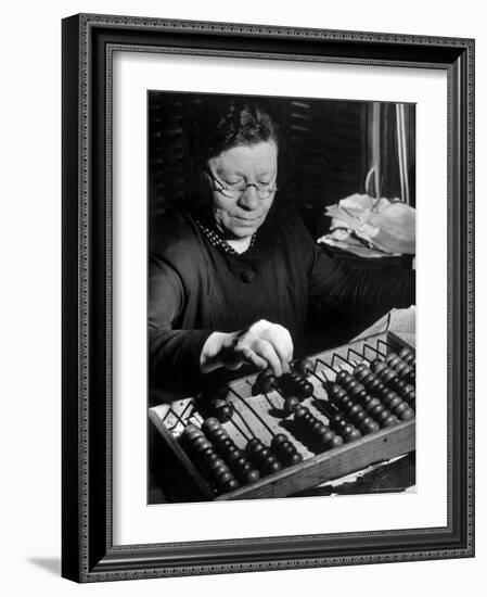 Russian Woman Using an Abacus to Calculate Numbers in Business-Margaret Bourke-White-Framed Photographic Print