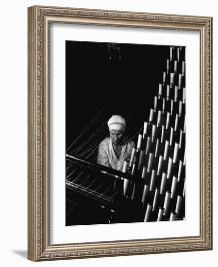 Russian Woman Working at Cloth Weaving Machine in a Textile Mill-Margaret Bourke-White-Framed Photographic Print