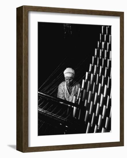 Russian Woman Working at Cloth Weaving Machine in a Textile Mill-Margaret Bourke-White-Framed Photographic Print