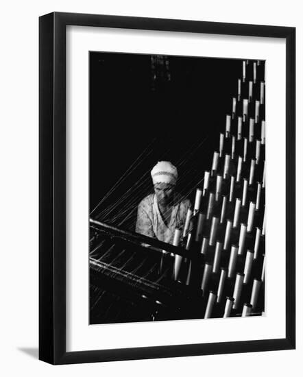 Russian Woman Working at Cloth Weaving Machine in a Textile Mill-Margaret Bourke-White-Framed Photographic Print