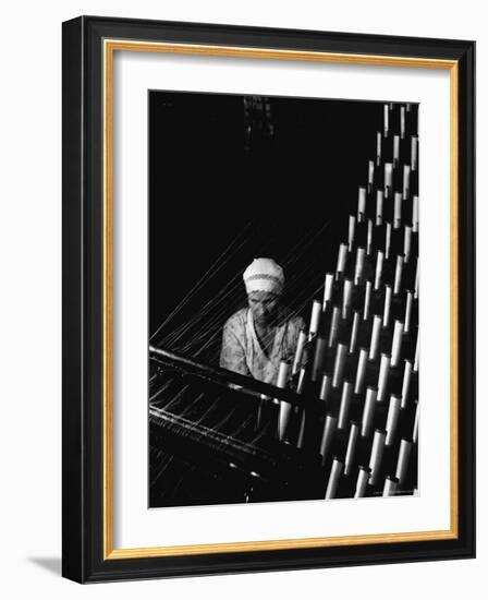 Russian Woman Working at Cloth Weaving Machine in a Textile Mill-Margaret Bourke-White-Framed Photographic Print