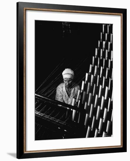 Russian Woman Working at Cloth Weaving Machine in a Textile Mill-Margaret Bourke-White-Framed Photographic Print