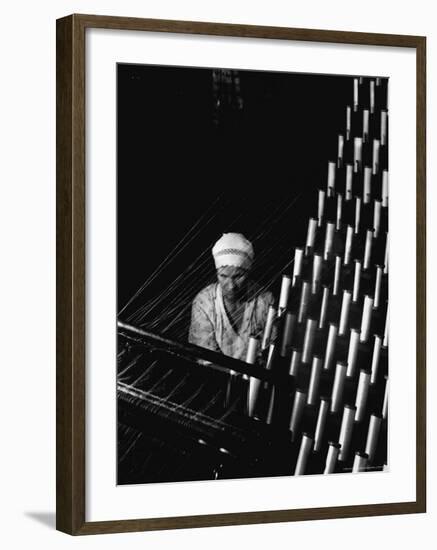 Russian Woman Working at Cloth Weaving Machine in a Textile Mill-Margaret Bourke-White-Framed Photographic Print