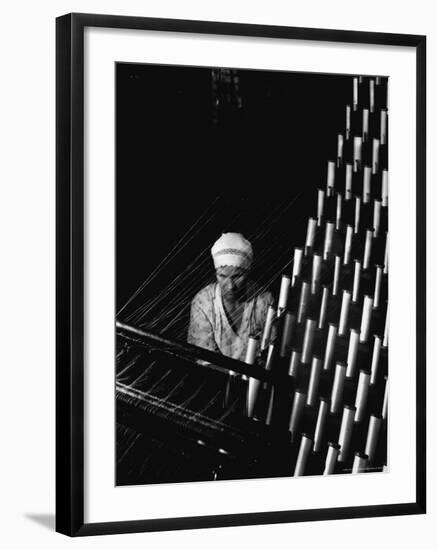 Russian Woman Working at Cloth Weaving Machine in a Textile Mill-Margaret Bourke-White-Framed Photographic Print