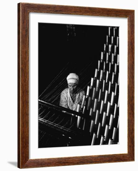 Russian Woman Working at Cloth Weaving Machine in a Textile Mill-Margaret Bourke-White-Framed Photographic Print