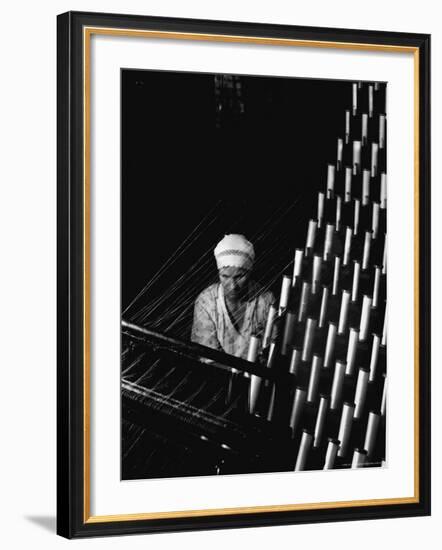 Russian Woman Working at Cloth Weaving Machine in a Textile Mill-Margaret Bourke-White-Framed Photographic Print