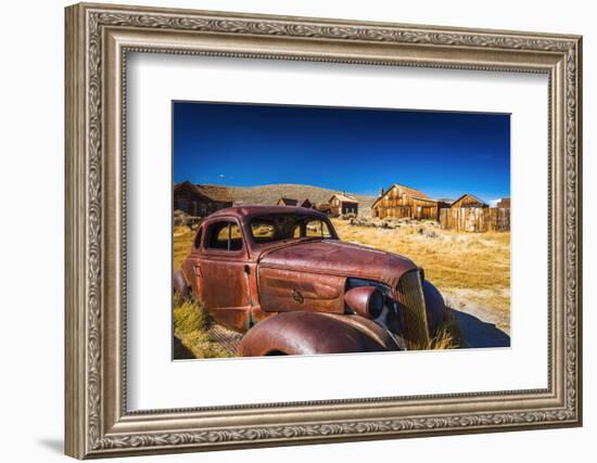 Rusted car and buildings, Bodie State Historic Park, California, USA-Russ Bishop-Framed Photographic Print