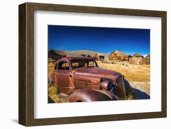 Rusted car and buildings, Bodie State Historic Park, California, USA-Russ Bishop-Framed Photographic Print