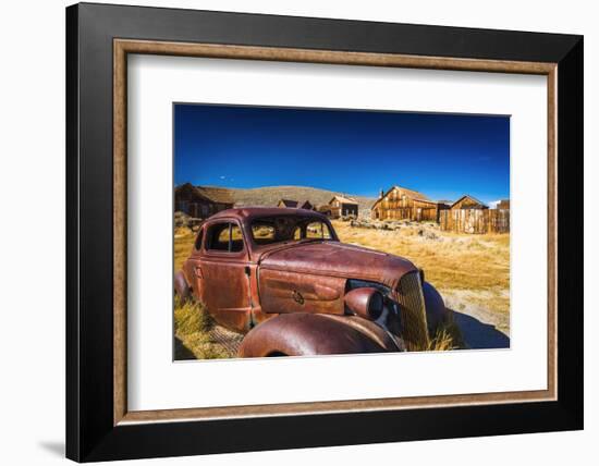 Rusted car and buildings, Bodie State Historic Park, California, USA-Russ Bishop-Framed Photographic Print