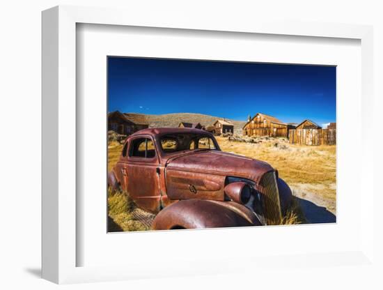 Rusted car and buildings, Bodie State Historic Park, California, USA-Russ Bishop-Framed Photographic Print
