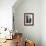 Rustic Barrels Lined Up Along an Old House Below a Window-Sheila Haddad-Framed Photographic Print displayed on a wall